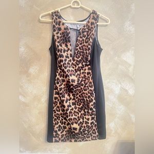 Leopard Dress. Front has black mesh to cover low cut size large.